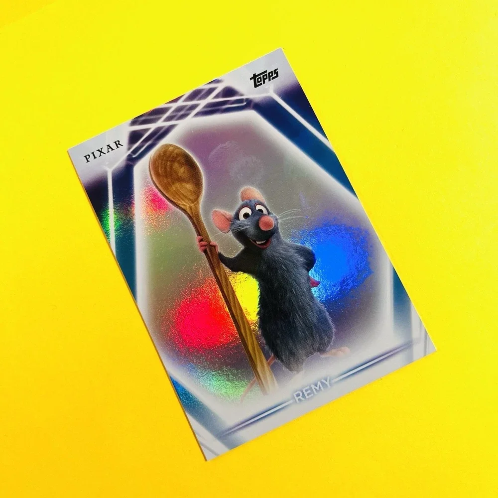 2026 Topps Disney Neon Remy‎ #71 Rainbow Refractor Pixar